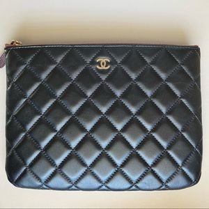 <SOLD>Chanel black o-case clutch